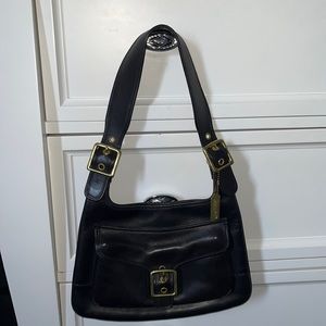 Coach black leather saddle bag